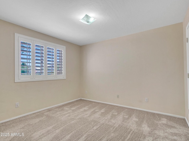 19506 N 73rd Ave, Glendale, AZ 85308 - empty room with carpet floors and baseboards