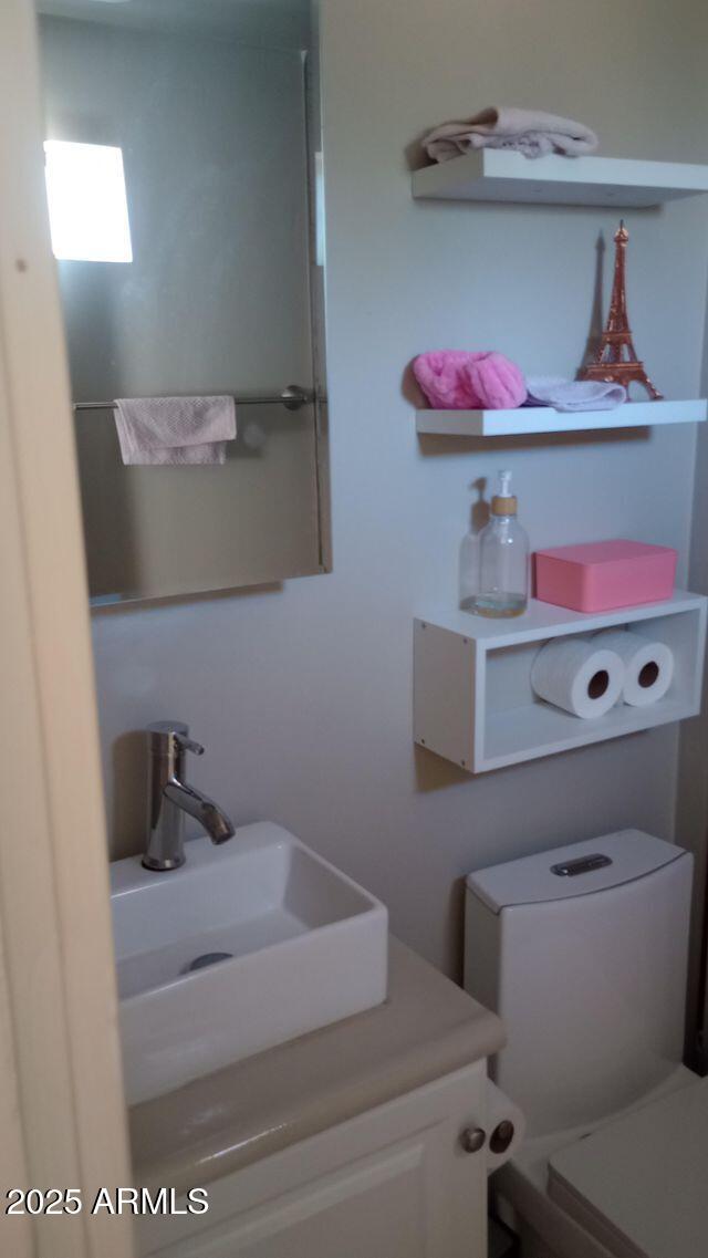 735 E 3rd St, Douglas, AZ 85608 - half bath featuring vanity and toilet