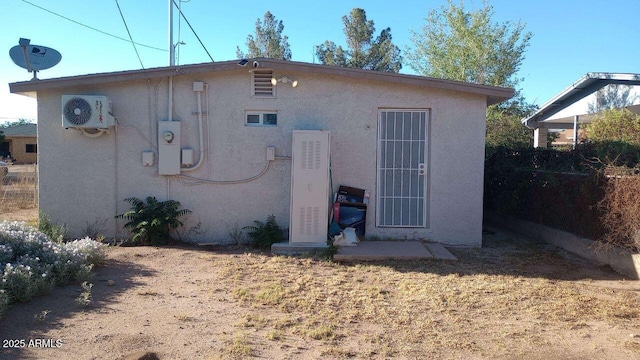 735 E 3rd St, Douglas, AZ 85608 - rear view of house with stucco siding