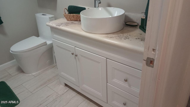 735 E 3rd St, Douglas, AZ 85608 - bathroom featuring vanity and toilet