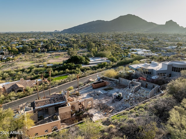 birds eye view of property with a mountain view