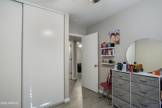 bedroom featuring light hardwood / wood-style flooring and a closet