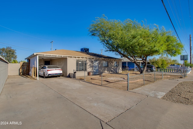 view of front of house featuring a carport