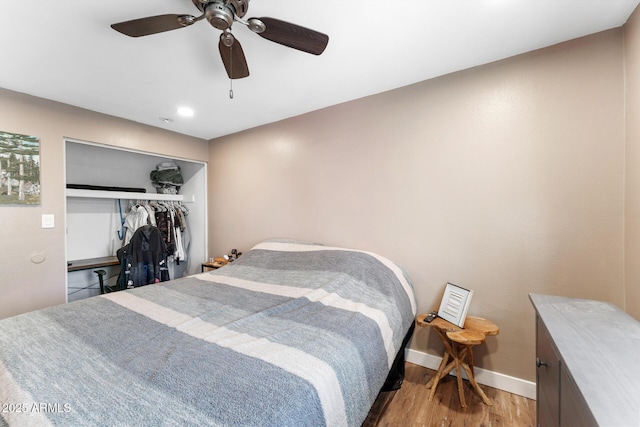 3508 E Gelding Dr, Phoenix, AZ 85032 - bedroom with light wood-style flooring, baseboards, a ceiling fan, a closet, and recessed lighting