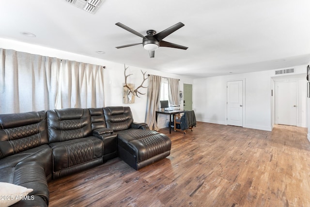3508 E Gelding Dr, Phoenix, AZ 85032 - living area featuring ceiling fan, wood finished floors, and baseboards
