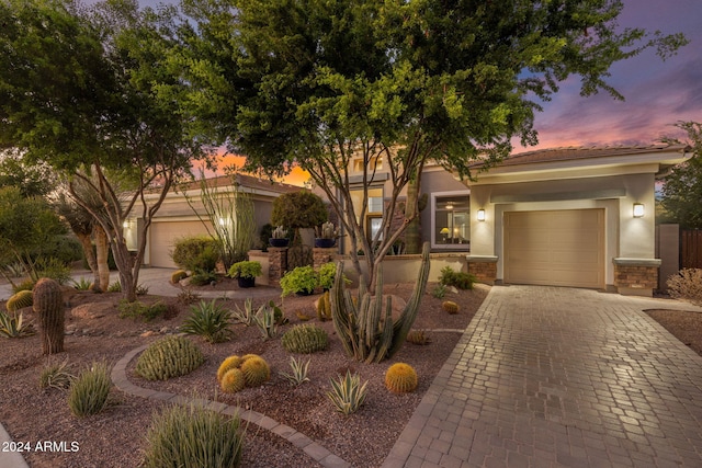 view of front of home with a garage