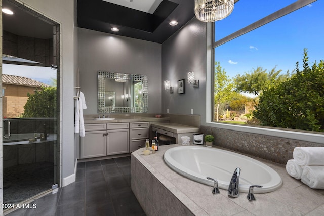 bathroom with vanity and plus walk in shower