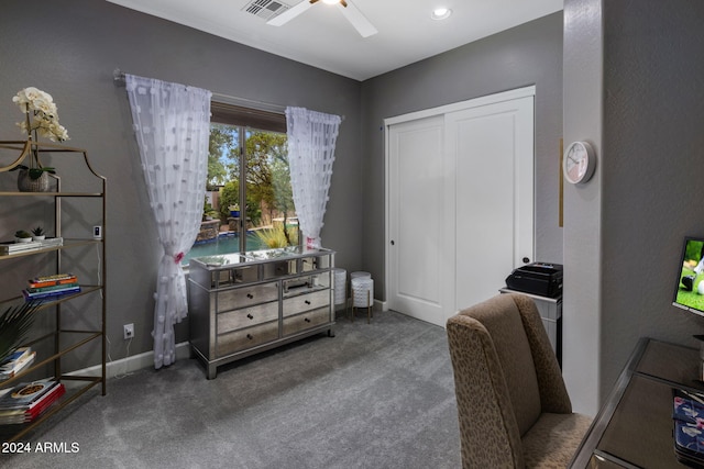 interior space featuring ceiling fan