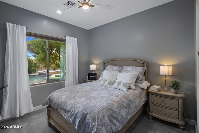 carpeted bedroom featuring ceiling fan