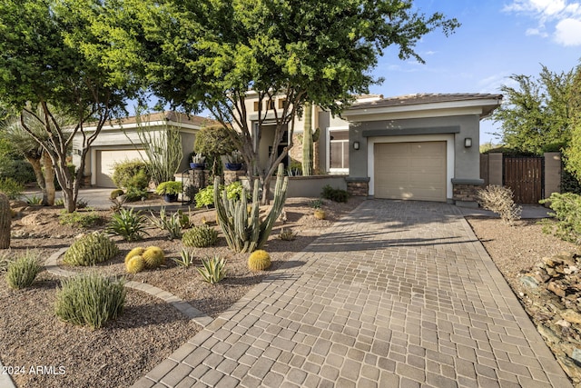 view of front of property with a garage