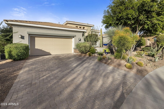 view of front of property featuring a garage