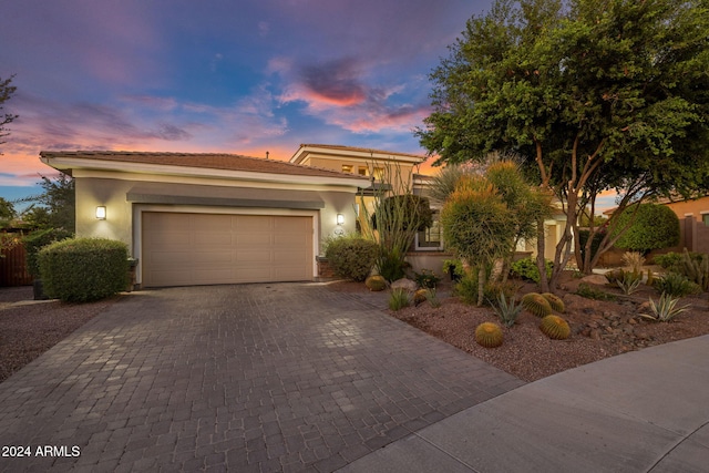 view of front of property featuring a garage