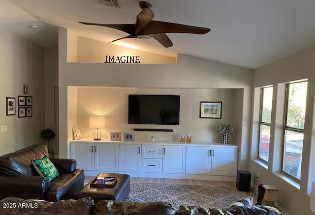 18132 E Vencino St, Gilbert, AZ 85298 - living area with vaulted ceiling, ceiling fan, and light wood-type flooring