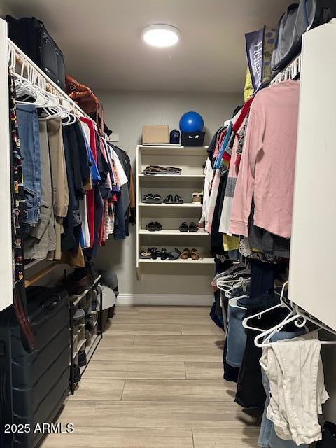 18132 E Vencino St, Gilbert, AZ 85298 - spacious closet featuring wood finished floors
