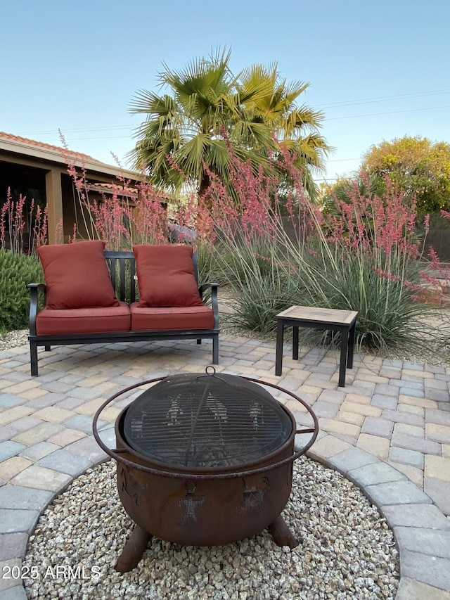 18132 E Vencino St, Gilbert, AZ 85298 - view of patio featuring a fire pit