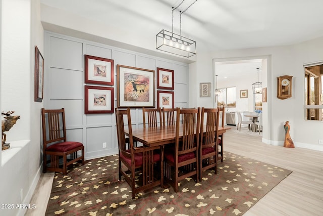 dining space featuring hardwood / wood-style floors