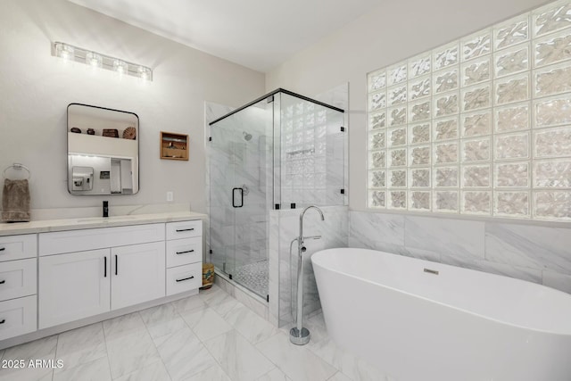 bathroom featuring vanity and plus walk in shower