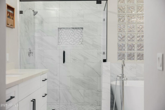 bathroom featuring vanity and plus walk in shower