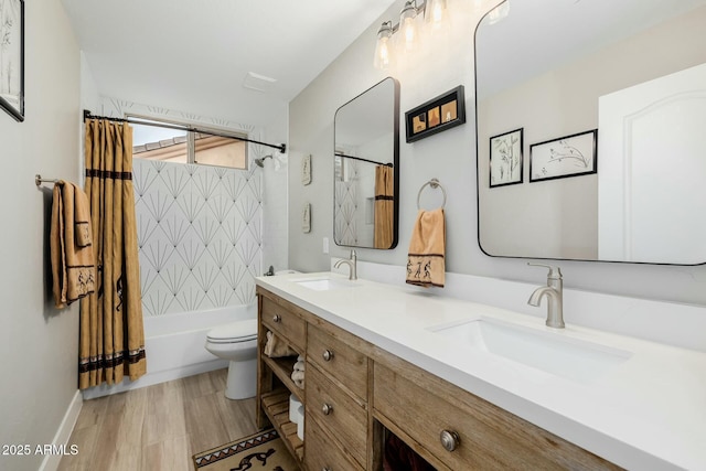 full bathroom with vanity, shower / bath combination with curtain, and toilet