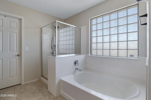 7715 S 69th Ln, Laveen, AZ 85339 - full bath featuring a shower stall, tile patterned flooring, and a garden tub