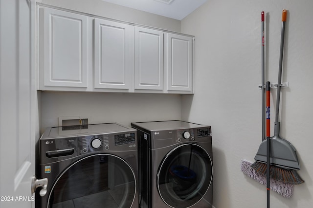 7715 S 69th Ln, Laveen, AZ 85339 - laundry room featuring washing machine and clothes dryer and cabinet space