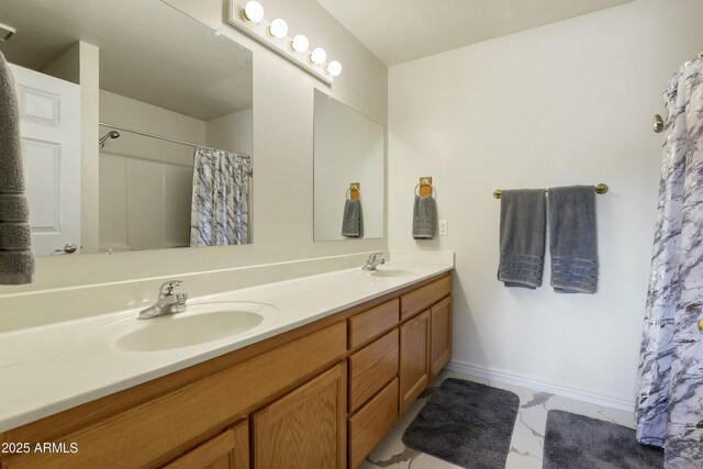 111 S Forest Park Dr, Payson, AZ 85541 - bathroom featuring a sink, baseboards, and double vanity