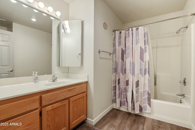 111 S Forest Park Dr, Payson, AZ 85541 - full bath with shower / bath combo, visible vents, baseboards, vanity, and wood finished floors