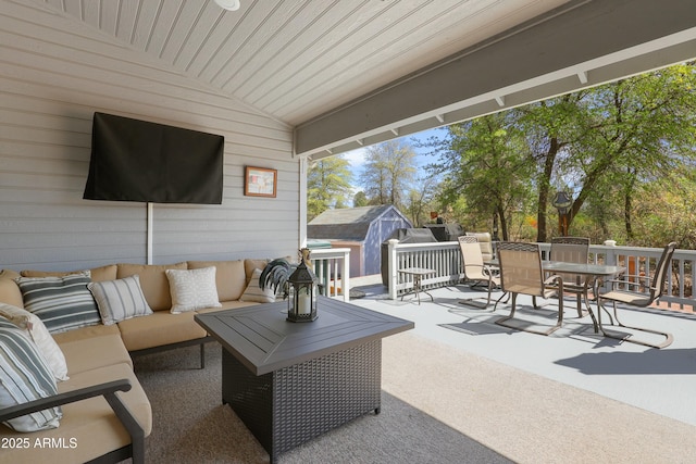 111 S Forest Park Dr, Payson, AZ 85541 - view of patio featuring an outdoor living space, a shed, outdoor dining area, and an outdoor structure