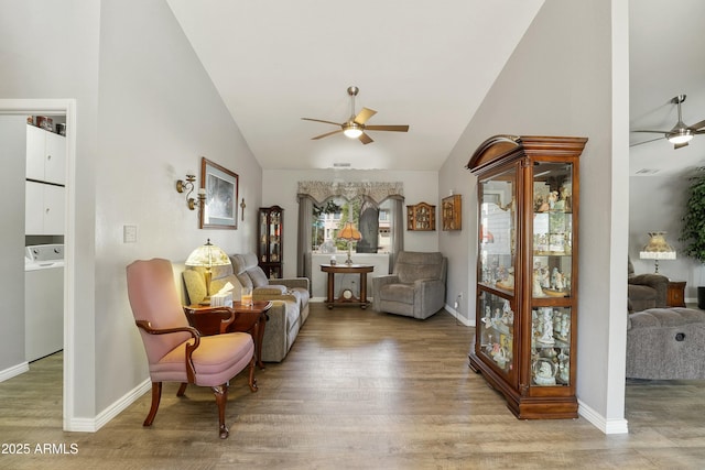 111 S Forest Park Dr, Payson, AZ 85541 - sitting room featuring washer / clothes dryer, baseboards, wood finished floors, and ceiling fan