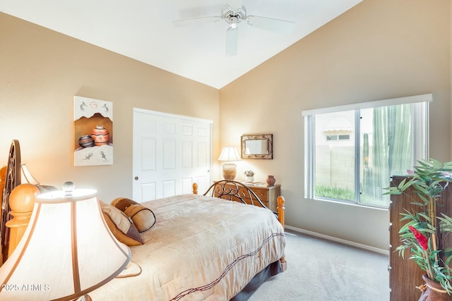 bedroom featuring vaulted ceiling, ceiling fan, and carpet