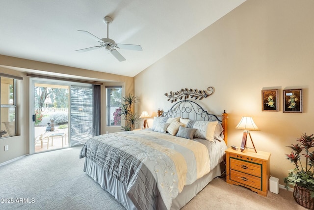 bedroom with access to exterior, vaulted ceiling, light colored carpet, and ceiling fan