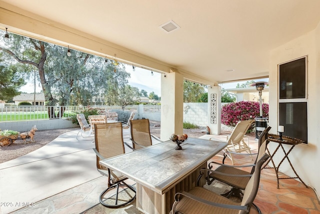 view of patio / terrace with outdoor dining area and a fenced backyard