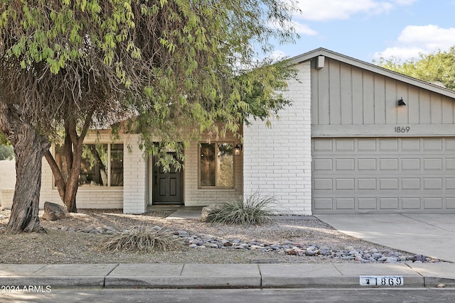 view of front of home with a garage