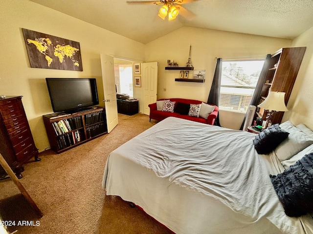 bedroom featuring ceiling fan, lofted ceiling, and carpet floors