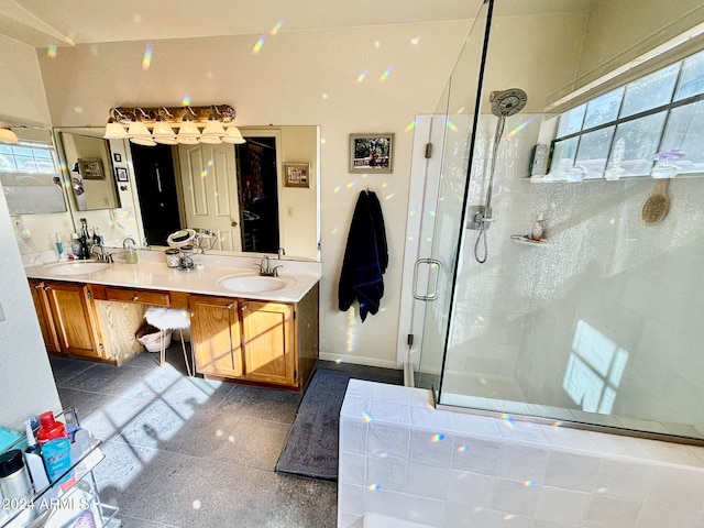 bathroom featuring vanity and a shower with shower door