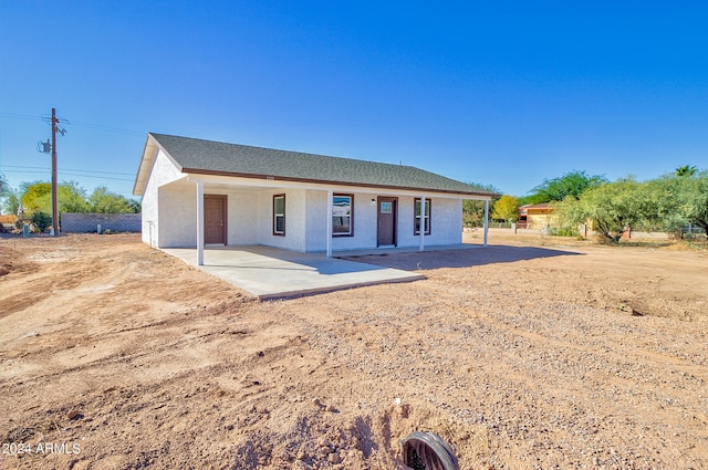 view of front of property with a patio