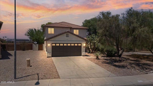 180 S 18th St, Coolidge, AZ 85128 - view of front of home with concrete driveway, stucco siding, and a tile roof