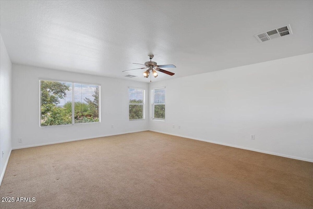 180 S 18th St, Coolidge, AZ 85128 - carpeted spare room with ceiling fan and baseboards