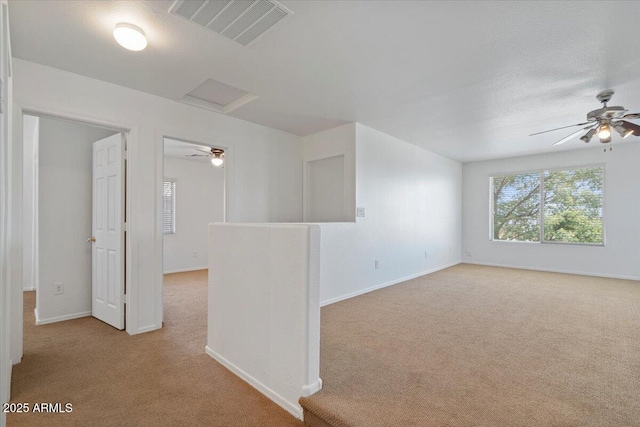 180 S 18th St, Coolidge, AZ 85128 - carpeted spare room featuring a ceiling fan and baseboards