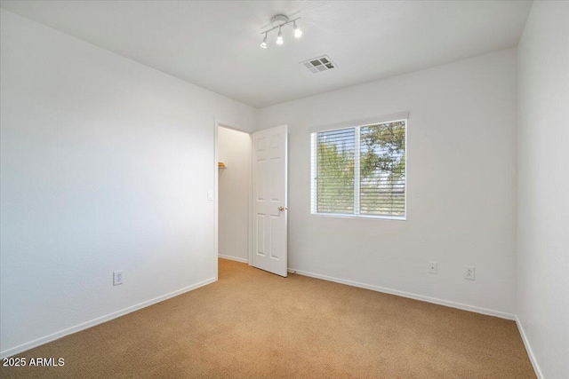 180 S 18th St, Coolidge, AZ 85128 - unfurnished room featuring light carpet and baseboards