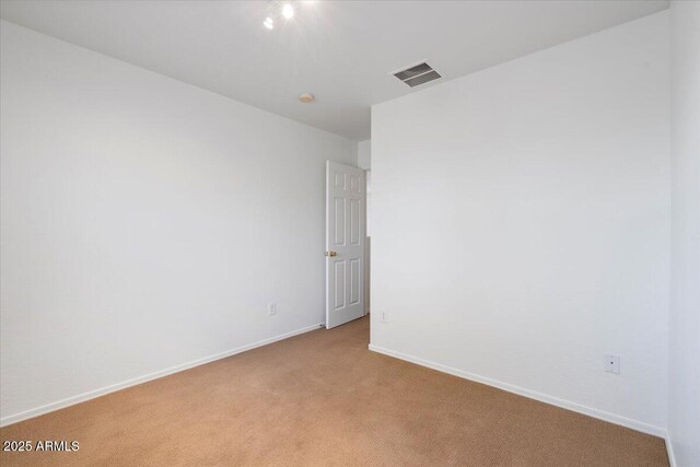 180 S 18th St, Coolidge, AZ 85128 - empty room with light carpet and baseboards