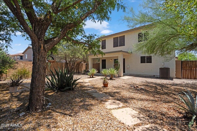 180 S 18th St, Coolidge, AZ 85128 - back of house with stucco siding and central AC