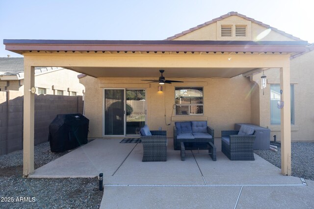 view of patio with an outdoor hangout area, ceiling fan, a grill, and fence