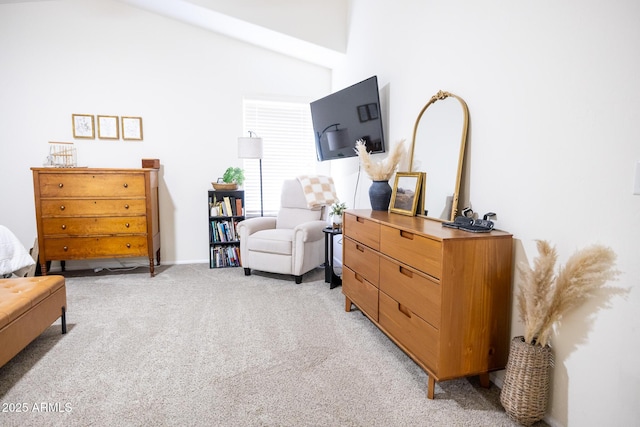 sitting room featuring light colored carpet