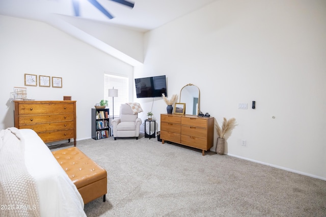 bedroom featuring vaulted ceiling, baseboards, and light colored carpet