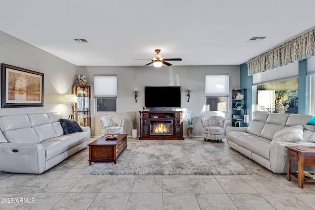 living room with ceiling fan