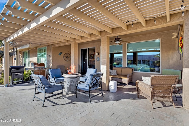 view of patio / terrace with a pergola, a grill, an outdoor living space with a fire pit, and ceiling fan