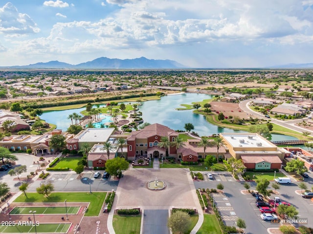 birds eye view of property with a residential view and a water and mountain view