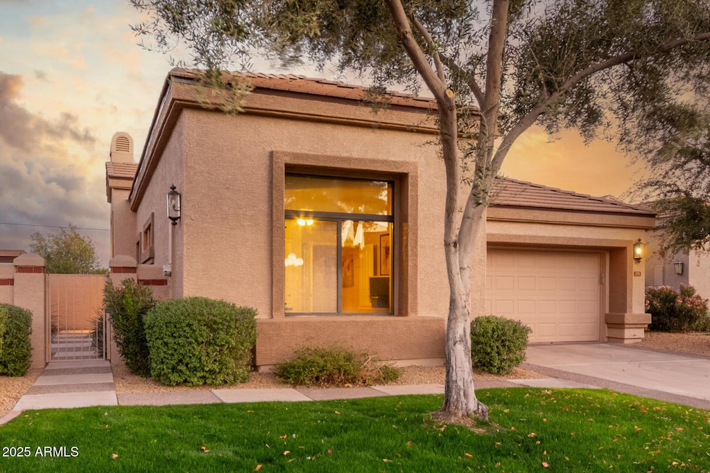 adobe home with a garage