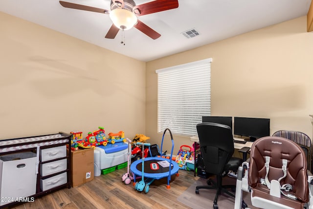 office area with ceiling fan and hardwood / wood-style floors